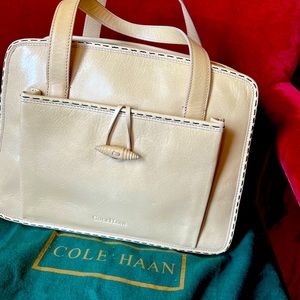 Cole Haan smooth leather crossbody bag with front. Beautiful  detail